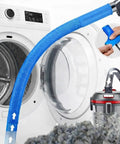 Pro Grade Dryer Vent Cleaner Kit with vacuum hose attached to dryer and lint brush, showcasing lint removal process.