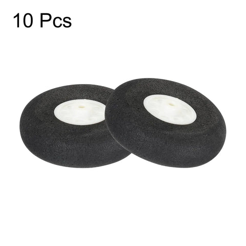RC Airplane Wheels 38mm Diameter 1.5 Inch Sponge Replacement Wheel Set Pack Of 10, black with white centers, aerial view