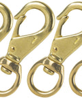 Genuine Solid Brass Swivel Snap Hooks 3 1/4 Inch close-up of four heavy duty swivel eye clip rings for outdoor use.