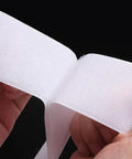 Heavy-Duty Sew-On Hook And Loop Tape Duo - Killer 3/4 Inch White Strips held in hands, showcasing non-adhesive nylon texture.