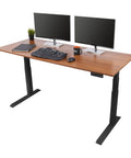 Heavy Duty Electric Standing Desk With Programmable Memory, smooth dual motor height lift, 72 inch warm teak surface, black legs.