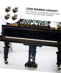 Built Tough Four Piece Vintage Brass Plate Casters With Smooth Rolling Heavy Duty Wheels on a piano, showing load capacity of 80 pounds.