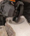 Knockout Turbo Scraper Wheel For Angle Grinders With Swivel Carbide Blades, plane raw lumber with precision on a wooden surface.
