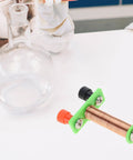 Hands On Electromagnet Experiment Kit For Teens With Real World Physics Projects, copper coil and connectors on table