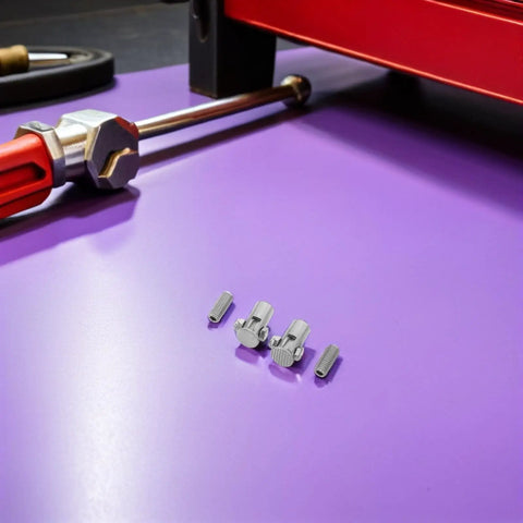 Pro Auto Dent Repair Kit With Iron Remover And Flexible Universal Head For Automotive Sheet Metal Reaches Deep Dents And Tight Spots With Durable Changeover Head For Pro And At Home Dent Fix, metal heads and screws on purple surface