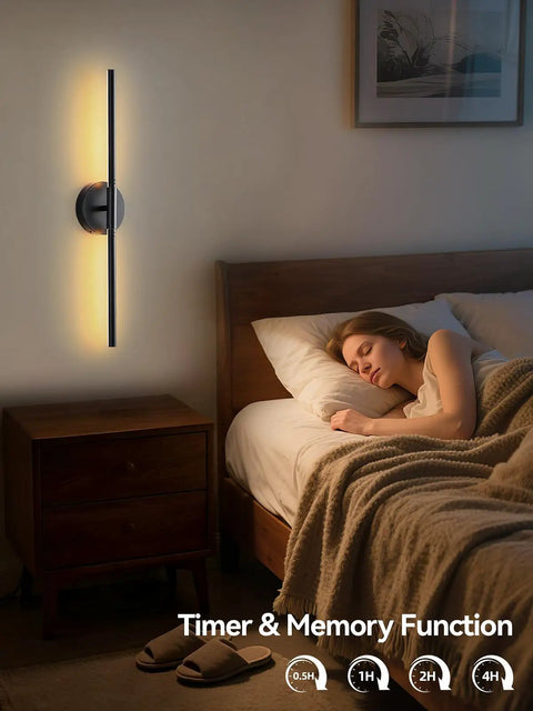Modern Cordless Wall Sconces Set Of 2 With Remote And Touch Dimming Rechargeable Battery Operated Led Lights For Bedroom Hallway 3000k To 6000k Sleek Black Metal bedside black wall sconce with warm lighting beside sleeping person.