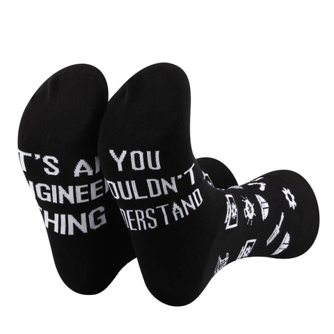 Image of black crew socks with white text "Its An Engineer Thing You Wouldnt Understand" for civil and mechanical engineers.