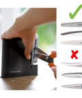 Clip Sharp Scissors Sharpener For All Scissors, durable plastic body in use, demonstrating quick no fuss sharpening.