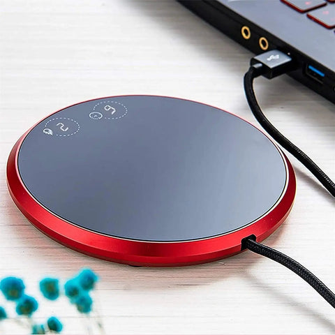 Electric Coffee Mug Warmer Heats Your Daily Brew Piping Hot With Precise Auto Timer And Dual Heat Settings Built From Scratch Safe Tempered Glass For Hella Reliability And Chill Desk Vibes on a desk with laptop