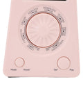 Close-up of Digital Metronome With Bluetooth Speaker Dope Tempo Tool For Piano And Guitar Ten Beat Tones Tuner in pink