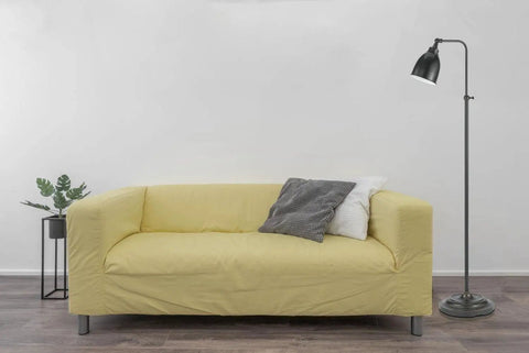 Traditional One Light Floor Lamp In Dark Bronze Finish For Living Room Or Den Pharmacy Style Tall Lamp With Classic Vibe Warm Ambient Glow And Sturdy Bronze Construction next to yellow sofa