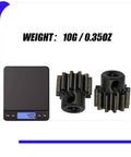 Two Pack 32P 11T 3mm Steel Pinion Gears for Axial Capra SCX10 AX30722 Upgrades next to scale showing 43.5 grams