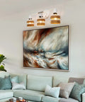 Contemporary 3 Light Vanity Wall Sconce With Wood Lampshade In Matte White And Brushed Nickel Accent above painting in living room.