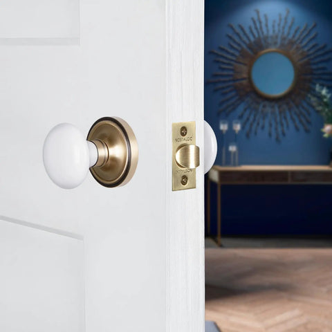 Classic Rosette White Porcelain Round Door Knob That Brings Old School Charm To Your Doors, Durable Porcelain Build, Timeless Vintage Vibe, And Ready In Multiple Finishes For Interior Entry Or Closet Doors