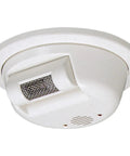 Heavy Duty Ultraviolet Flame Sensor That Brings The Heat Detection Straight To Your Security Rig With Hella Sensitivity And A Solid Thirty Three Foot Range For Serious Fire Protection Peace Of Mind mounted on a ceiling.