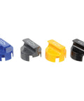 Four multi-colored attachments from the Camshaft Synchronizer Alignment Tool Kit For Ford, Mazda, And Mercury Vehicles.