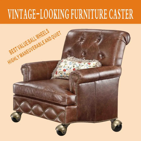 Vintage 2 Inch Ball Caster Wheels For Furniture Antique Brass Swivel Plate Castors on a brown leather armchair.