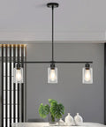 3 Light Black Kitchen Island Lighting Fixture Over Table Totally Modern Linear Chandelier With Clear Glass Shades Farmhouse Style Pendant Lights For Kitchen And Dining Room shown over dining table