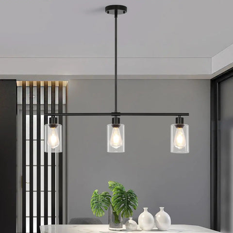 3 Light Black Kitchen Island Lighting Fixture Over Table Totally Modern Linear Chandelier With Clear Glass Shades Farmhouse Style Pendant Lights For Kitchen And Dining Room shown over dining table