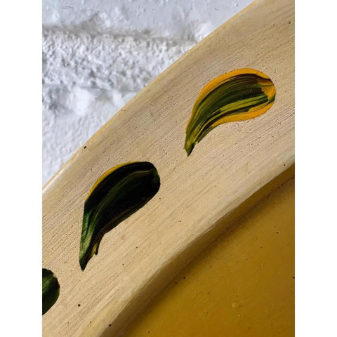 Close-up of leaf detail on Hand Painted Strawberry Lazy Susan 19.5 Inch for Farmhouse Kitchen Decor and Organization.