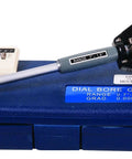Angled side view of Fowler dial bore gauge set, 0.7–1.5 in range, blue case with interchangeable anvils