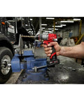 Compact Cordless Drill Driver With Brushless Motor Pumping 12 Volts Of Snappy Power Via An Ironclad 1/2 Inch All Metal Chuck in use.