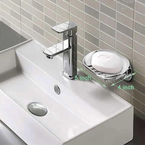 Powerful Suction Cup Soap Dish for Shower and Kitchen No Drill Mount Holds Up to 7.5 Pounds Easy No Tool Install Elegant Arc Design With 5 Drain Holes Drains Water Fast Keeps Soap Dry and Ready for Use mounted on a bathroom sink wall.