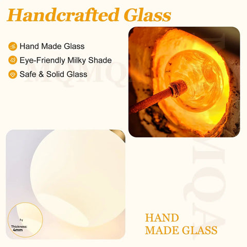 Handcrafted glass showing an eye-friendly milky shade with handmade details for Two Pack Brushed Gold Globe Pendant Lights With Mid Century Modern Vibes And Smooth Opal Glass Shades Totally Adjustable Hanging Fixtures Solid Pick For Kitchen Island Or Dining Rooms.