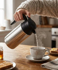 Boss Level 24v Electric Water Kettle For Truckers And Road Warriors 750ml Stainless Steel being poured into a coffee cup.