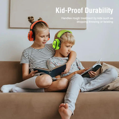 Kids wearing Kids Noise Canceling Ear Muffs 27.4dB 2 Pack Adjustable Hearing Protection For Toddlers And Teens Age 3 To 16 reading on sofa