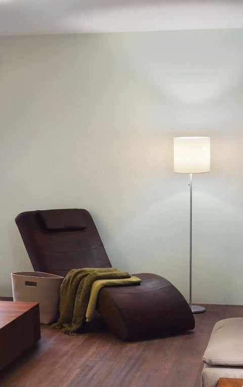LED Plug In Floor Lamp With Creme Fabric Shade, 70 Inch Tall, Brushed Aluminum Finish in a modern living room setup.