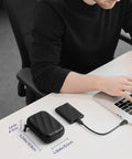 Person working at desk with Hard Case For T9 T7 Shield T7 Portable SSDs Custom Fit Protective Carry Case In Black beside laptop