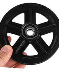 A Pair Of Heavy Duty Replacement Pulley Wheels For Sliding Barn Doors And Metal Gates Built For Roll Like Butter Performance With Sealed Bearings And Zero Hassle Everyday Reliability, close-up view in hand.
