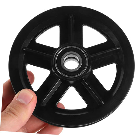 A Pair Of Heavy Duty Replacement Pulley Wheels For Sliding Barn Doors And Metal Gates Built For Roll Like Butter Performance With Sealed Bearings And Zero Hassle Everyday Reliability, close-up view in hand.