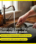 Washing Lightweight Carbon Steel Skillet For High Heat Frying With Long Handle in kitchen sink, non-toxic and sustainably made.