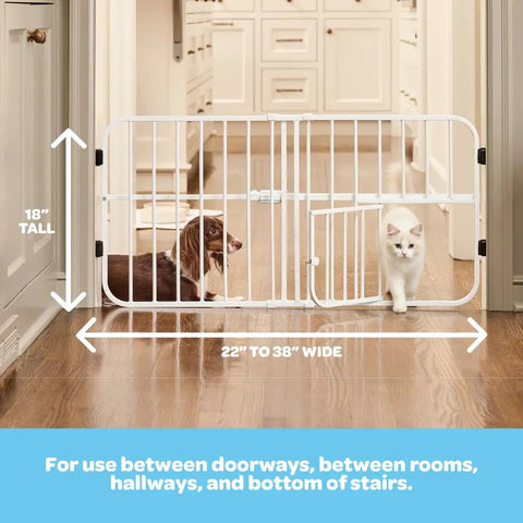 No Drill Pressure Mount Metal Dog Gate For Doorways And Hallways Expandable From 22 To 38 Inches 18 Inches Tall White Indoor Gate With Small Pet Door Easy Setup Rust Resistant And Wall Friendly For Stairs And Openings shown with dog and cat passing through pet door
