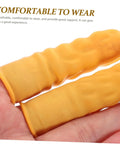 Close-up of Top Shelf 100 Pack Yellow Latex Finger Sleeves in hand, showing texture for grip and comfort during heavy lifting.