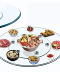Transparent Tempered Glass Lazy Susan Turntable 40 Inch Large Rotating Tray with various dishes on dining table