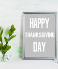 Framed sign with 'HAPPY THANKSGIVING DAY' written in white vinyl letters, using No Fuss Easy Peel Vinyl Letter Stickers 8 Sheet Set.