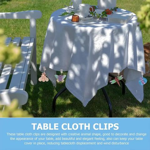 Alloy Tablecloth Clips Eight Pack 2.36 Inch Wide Non Slip Outdoor Tablecloth Holders secure white table cover on picnic table.