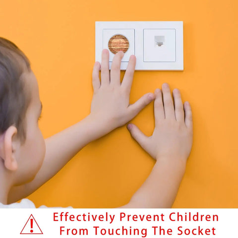 Slick Pine Wood Texture Child Proof Outlet Covers For Wall Sockets on orange wall, child’s hands touching the plugs.