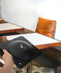 Badass Heavy Duty Cast Iron Table Leg Connector Plate With Screw Rock Solid Furniture Mounting Hardware For Smooth Diy Assembly and Built Tough Stability in hand.