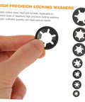Hand holding carbon steel locking washer from 630 Piece Bearing Clip Washer Set With Carbon Steel Locking Washers And Internal Tooth Design