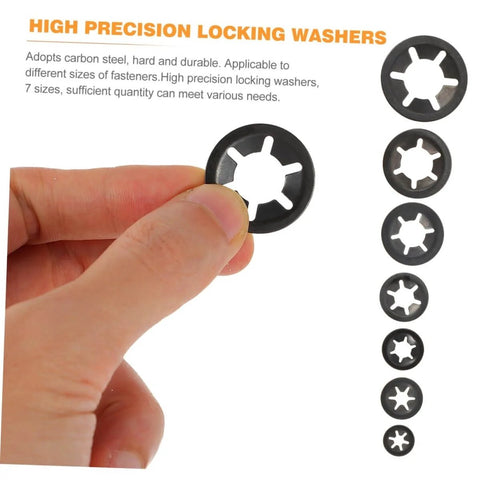 Hand holding carbon steel locking washer from 630 Piece Bearing Clip Washer Set With Carbon Steel Locking Washers And Internal Tooth Design