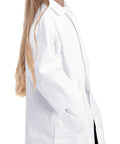 Young girl wearing Kids Lab Coat For Girls And Boys White Doctor Dress Up Coat With Front Button Closure, Two Front Pockets, And Back Vent
