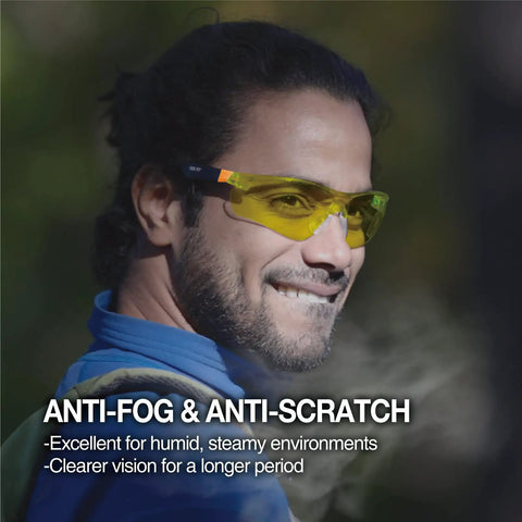 Person wearing Yellow Lens Safety Glasses With Blue Light Blocking And Night Vision Enhancement For Shooting, Gaming And Low Light Work, Anti Fog Z87.1 Eye Protection, Adjustable Arms, Black And Orange.