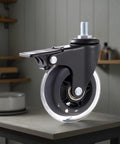 Set Of Five 3 Inch PU Caster Wheels With Locking Brakes For Heavy Duty Furniture And Work Carts Roll Smoother Than Silk And Built Tough For Everyday Shop Grind And No Fuss M6 M8 M10 Mount Swaps close-up of single caster wheel with black housing and clear tread on surface