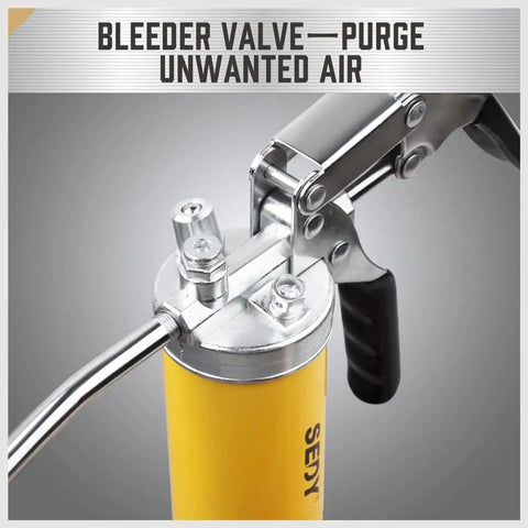 Close-up of heavy duty grease gun kit with 8000 PSI pistol, featuring bleeder valve for air purge, yellow tube visible.