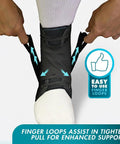 Speed Lacer Ankle Brace With Quick Pull Hook And Loop Closure Delivers Fast Even Compression For Sprained Ankles And Peroneal Tendonitis Orthopedic Ankle Support For Men Women Adults Teens And Kids Black Large being adjusted with finger loops