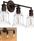 Three Light Vanity Light Dope Oil Rubbed Bronze With Clear Cylinder Glass Over Mirror Bathroom Fixture For Modern Farmhouse Style 3 Lamp Vanity Lighting For Any Bath Decor